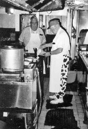 Cookie Sadlier And Joe Levin At Work In The Lst-325 Galley (no Information