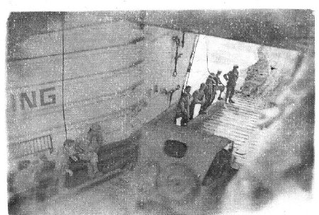 Unloading jeep off of LST-751 during WW11