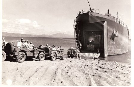 LST loading jeeps bound for Italy, WWII