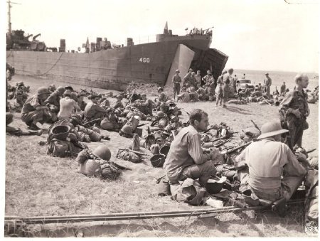 Infantry relaxing after landing on Guadalcanal