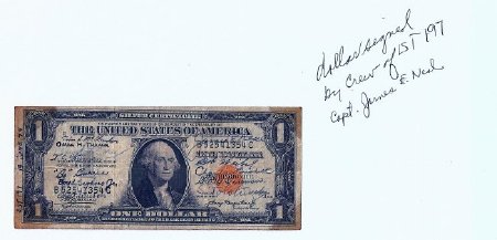 Dollar bill signed by crew members LST-197